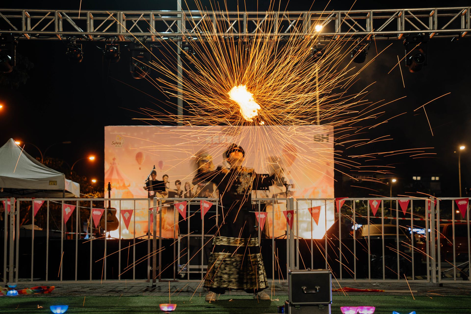Fire performer on the Ice Cream Festival stage